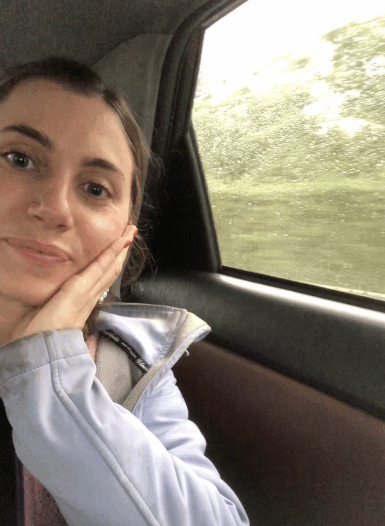 Smiling on my way to surprise my boyfriend, feeling confident thanks to traveling solo