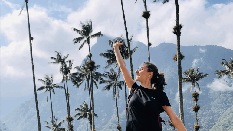 Photo with palm trees in Cocora Valley, building confidence with solo travel
