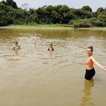 Swimming near crocodiles in the Amazon