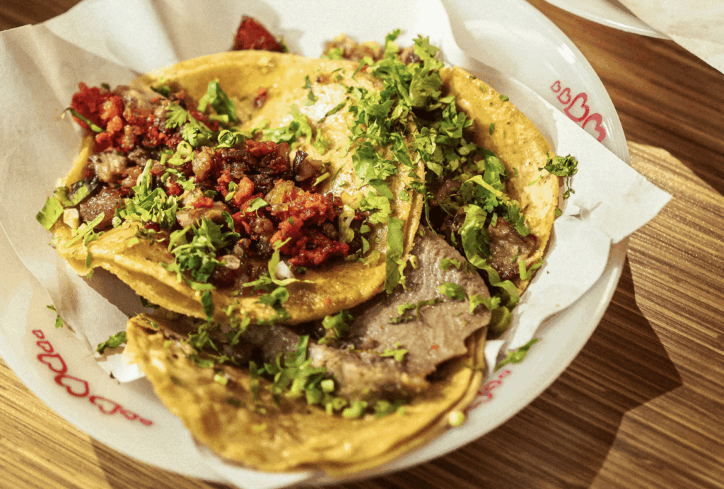 Tacos with green and red sauce