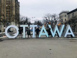 Ottawa sign photo with family, Canada